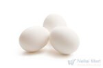Fresh farm eggs neatly arranged for sale at Nellai Mart grocery store